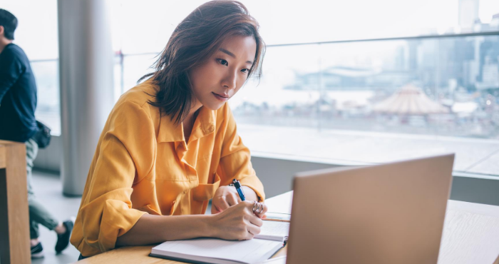 asian-woman-professional-overseas-lawyer-studying-laptop
