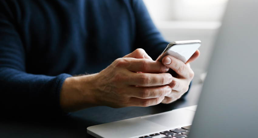 SQE _ Website images career clinic support _ Jan 2021 (1) man-at-laptop-dialling-on-phone