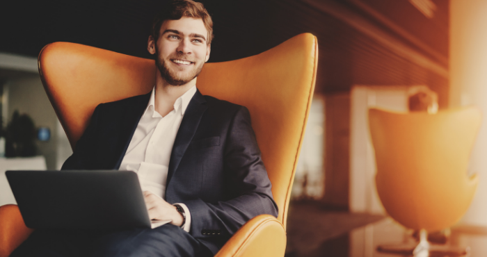 a-male-aspiring-solicitor-legal-executive-on-chair-wth-laptop