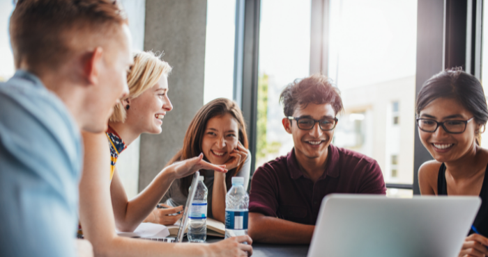 students-working-together-at-desk-on-10-week-sqe1-prep-course