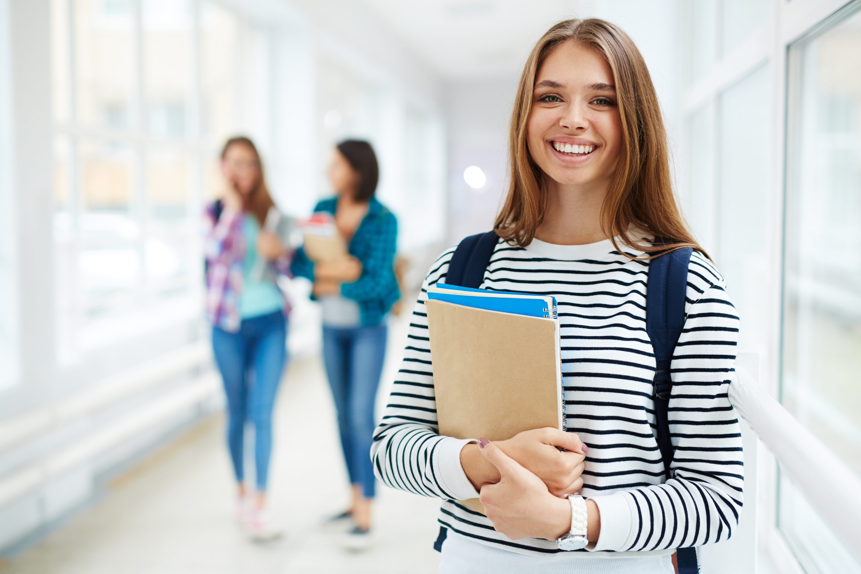Studying at college Portrait of beautiful smiing female college student